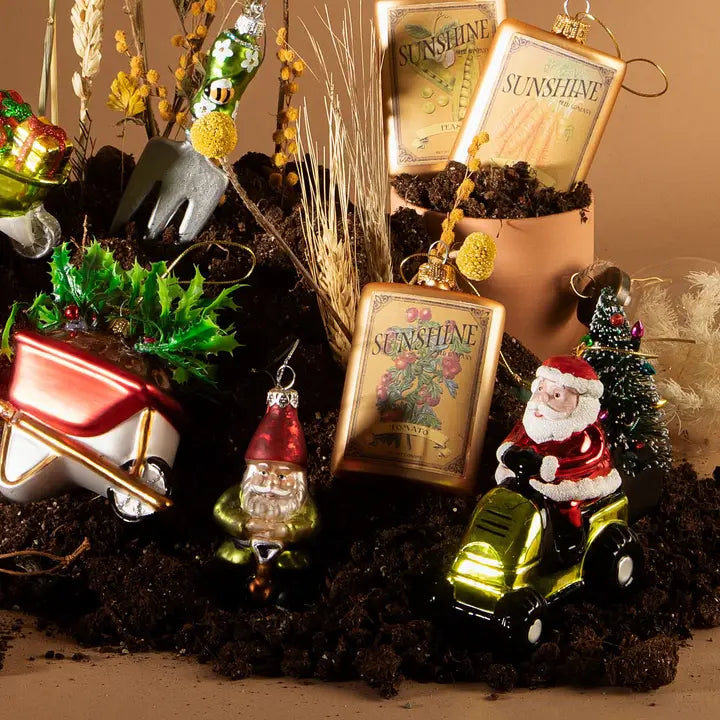 Sass and Belle Santa On A Lawn Mower Shaped Bauble